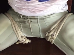 Football jock tied to chair and tape gagged - young man bound and gagged