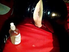 Rubber Latex Master fisting his rubber slave