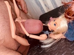 Man enjoys self-pleasure with a sex doll, unloading a massive cum shot