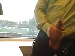 Big cock cumming on a window