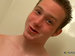 Chiseled first-timer tugs his schlong and pisses on himself solo