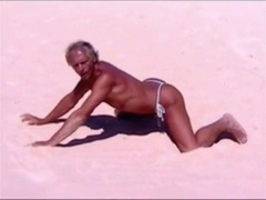 Tanned guy on beach in tiny string thong (temporarily!) 11