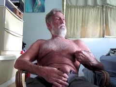 Senior man enjoys ball play in high-definition video with hairy cock and balls in close-up scenes