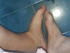 I masturbate my cock and play with my feet