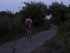 little girl is walking outside