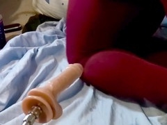 Chubby dark-skinned crossdresser Devin Vine gets ass blasted by a dildo machine