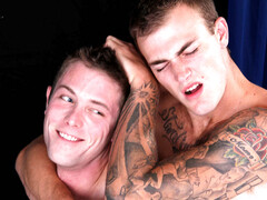 Hot males present their asses on set in a flaming gay duo