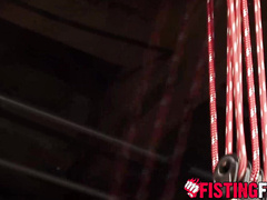 Uniformed interrogator Dirk Caber drives his fist into his helpless prisoner