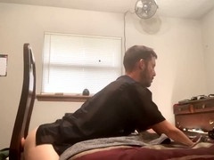 Tightly toned ass gets played with a hefty dildo