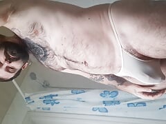 bear takes a shower, dries his hairy body and puts on a thong with his big ass