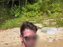 Draining off on the beach in thailand and nutting in the water. Public masturbate off