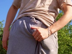 Two young dudes enjoy summer fun, sucking by the sea