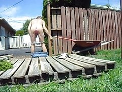 sissy outdoor chores with pink buttplug
