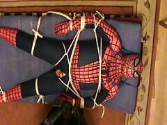 Restrained Spiderman is milked