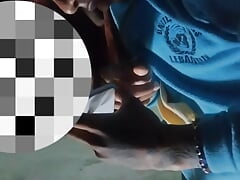 Young man with athletic body masturbating in the living room