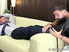 Hairy businessman Joey J restrained and worshiped by a foot fetish deviant