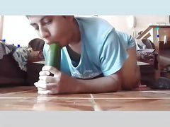 Sucking huge cucumber