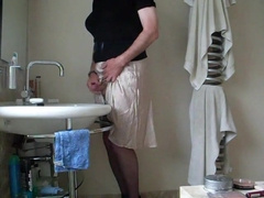 Demurely dressed crossdresser wanking and cumming 8