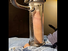 milking machine enlarges and sucks cock