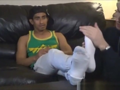 Handsome Juan has his feet worshipped