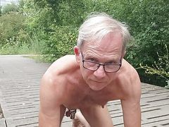 In the park, naked and horny