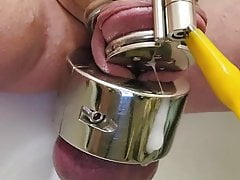 Humiliating cum with chastity and stretched balls