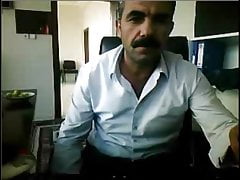 Arab mustached Daddy wanks his big cock