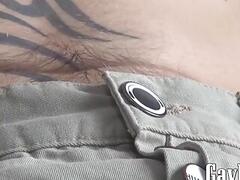 Tattooed twink Axel masturbates solo while watching porn
