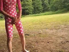 young boy in mid-leght swimsuit masturbate and cum outdoor