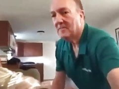Clothed grandpa on his knees sucking daddy's cock