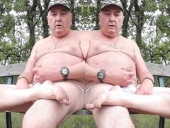 Chubby bears enjoy foot worship and handjob outdoors