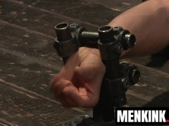 Connor Patricks tormented in tight metal bondage without mercy