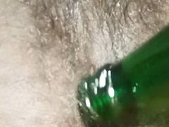 A glass bottle in my ass very hardly