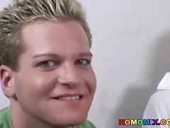 Blonde guy does terrible blowjob on a black cock