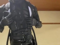 Condom fellow dressed in rubber gear