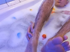 Young homo. With a XXL man rod. Uber-Cute soles. Wanking off in a red-hot bathtub. (Part two)