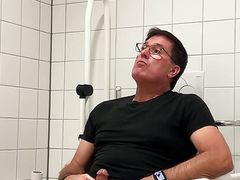Jerking off in a public restroom at the medical building. Unedited