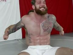 Sexy boys show off their strength during wrestling match