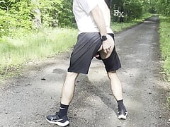 businessman is riding the dildo outdoor in public and he is cumming outside by the road