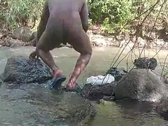 XXL black manmeat boy getting off while taking a bathroom outdoors and shooting huge flow