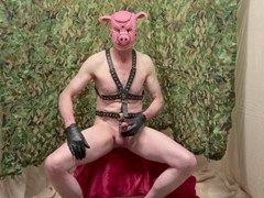 Horny guy jerking off with a sexy strap-on