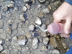 Cumshot29 in the river by Eclipse80