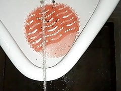 Peeing in urinal