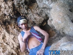 Asian twink strokes his cock and anal plays outdoor