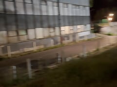Exhib in front of a taxi and truck with cum