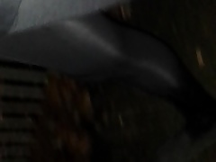 shiny leggings on motorway bridge