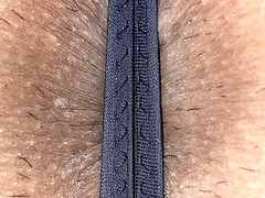 A Japanese man in women's underwear shows his buttocks and anus.