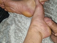 Horny hairy grandpa masturbating with foot worship in close-up