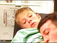 Horny gay doc seduces an adorable blond youngster