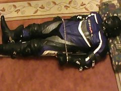 Shackled bikerslave is restrained
